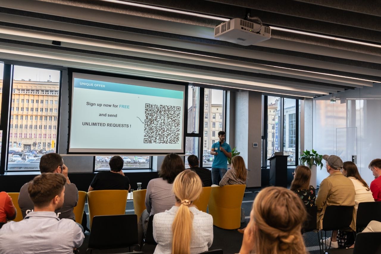 Francisco presenting in Warsaw conference room